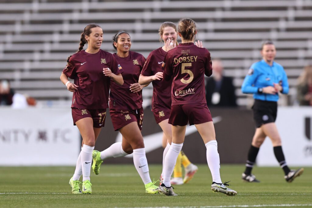 Lexi Missimo #10 of Dallas Trinity FC celebrates with her teammates after scoring the opening goal during match between Dallas Trinity FC and Tampa Bay Sun FC at Cotton Bowl.