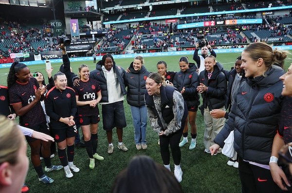 Morgan Weaver #22 of Portland Thorns FC talks to the team in a huddle after the NWSL match between Portland Thorns and Houston Dash at Providence Park
