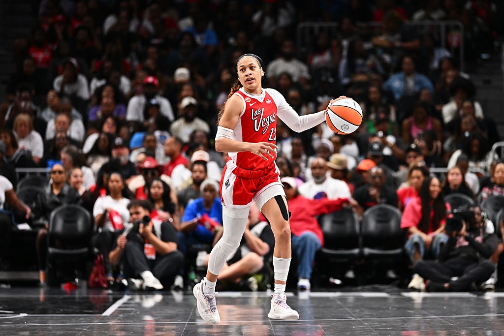Chennedy Carter #23 of the Las Vegas Aces dribbles the ball during the game against the Atlanta Dream.