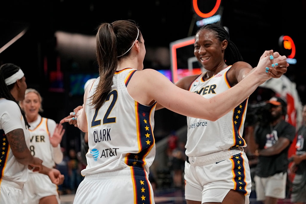 Caitlin Clark #22 of the Indiana Fever celebrates with Aliyah Boston #7 after scoring the game-winning three pointer during the second half against the Washington Mystics at CareFirst Arena on June 08, 2026 in Washington, DC.