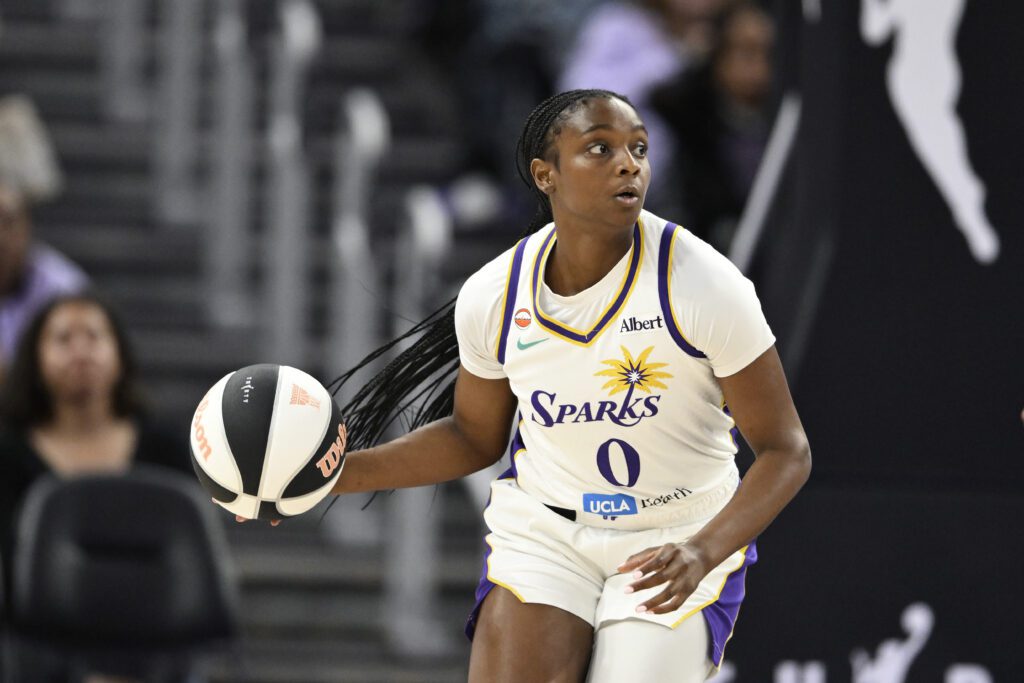 Ta'Niya Latson #0 of the Los Angeles Sparks dribbles against the Golden State Valkyries in the fourth quarter during a Commissioner's Cup game at Chase Center.
