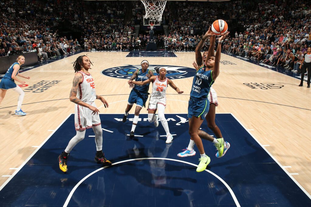 Courtney Williams #10 of the Minnesota Lynx rebounds the ball during the game against the Connecticut Sun on July 6, 2026 at Target Center in Minneapolis, Minnesota.
