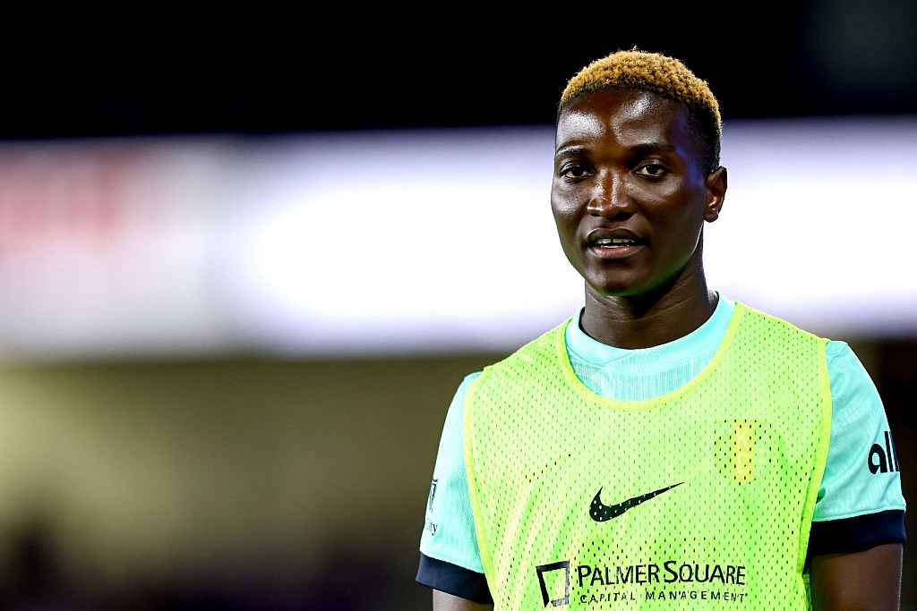 Temwa Chawinga #6 of the Kansas City Current looks on during the match between Orlando Pride and Kansas City Current