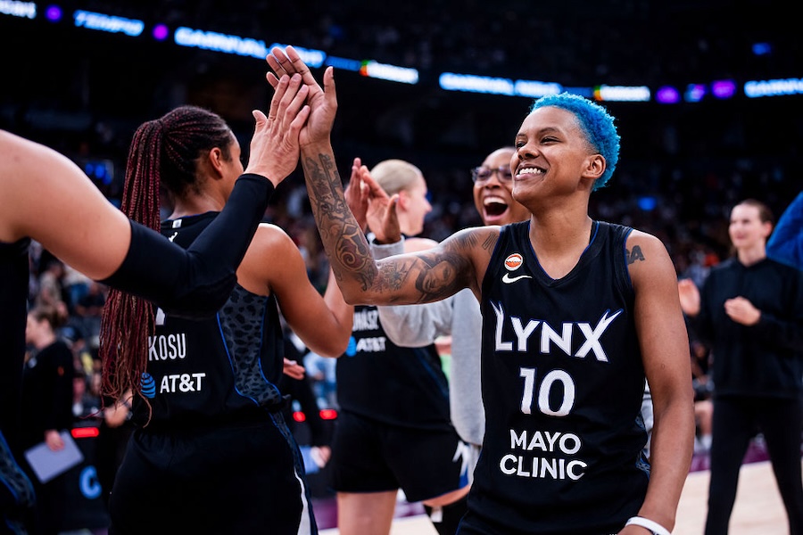 Courtney Williams #10 of the Minnesota Lynx celebrates with teammates after defeating the Toronto Tempo at Scotiabank Arena on July 30, 2026 in Toronto, Canada
