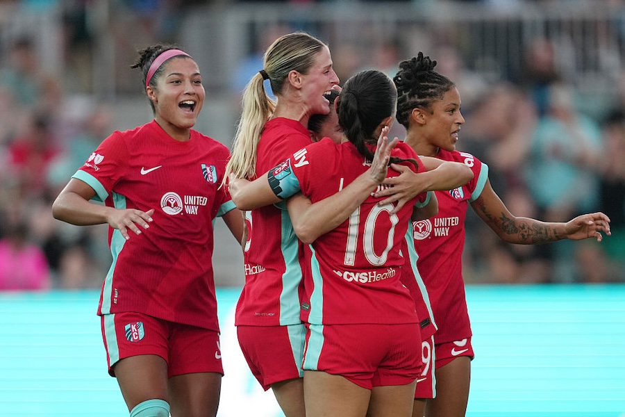 Haley Hopkins #13 of Kansas City Current celebrates scoring her team's fourth goal during the NWSL match between Kansas City Current and Racing Louisville FC