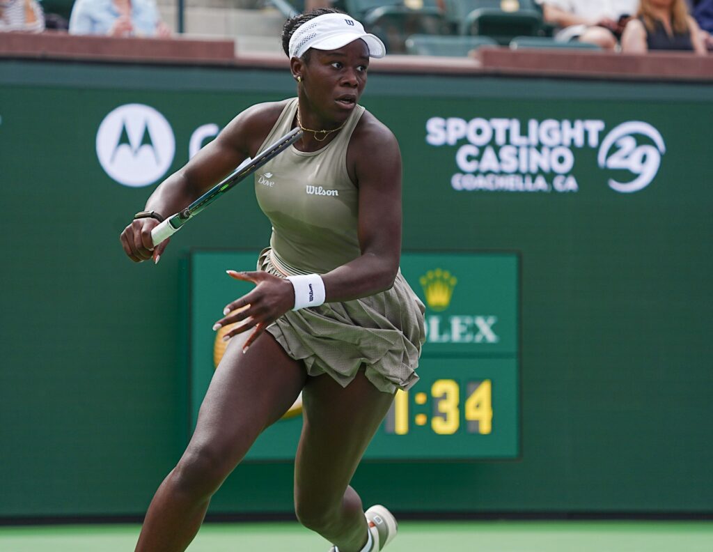 Victoria Mboko runs down a shot during round 2 win at the BNP Paribas Open at the Indian Wells Tennis Garden.