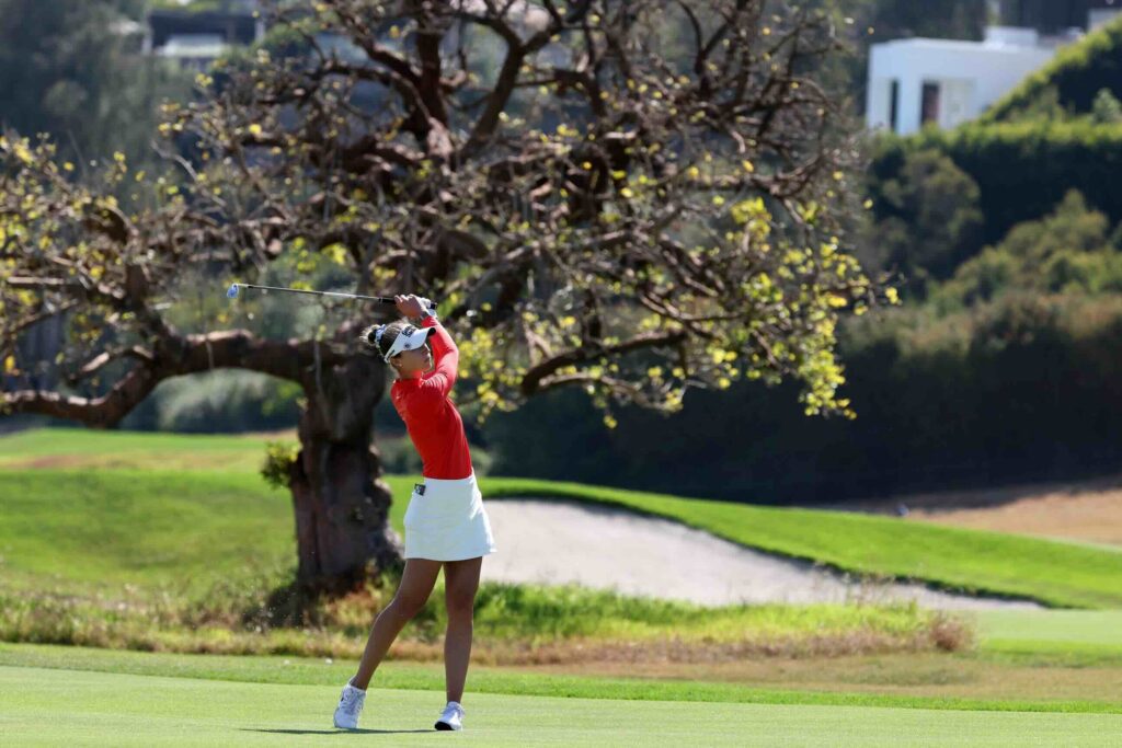 Nelly Korda hits her second shot on the ninth hole during the third round of the U.S. Women's Open golf tournament at Riviera Country Club.