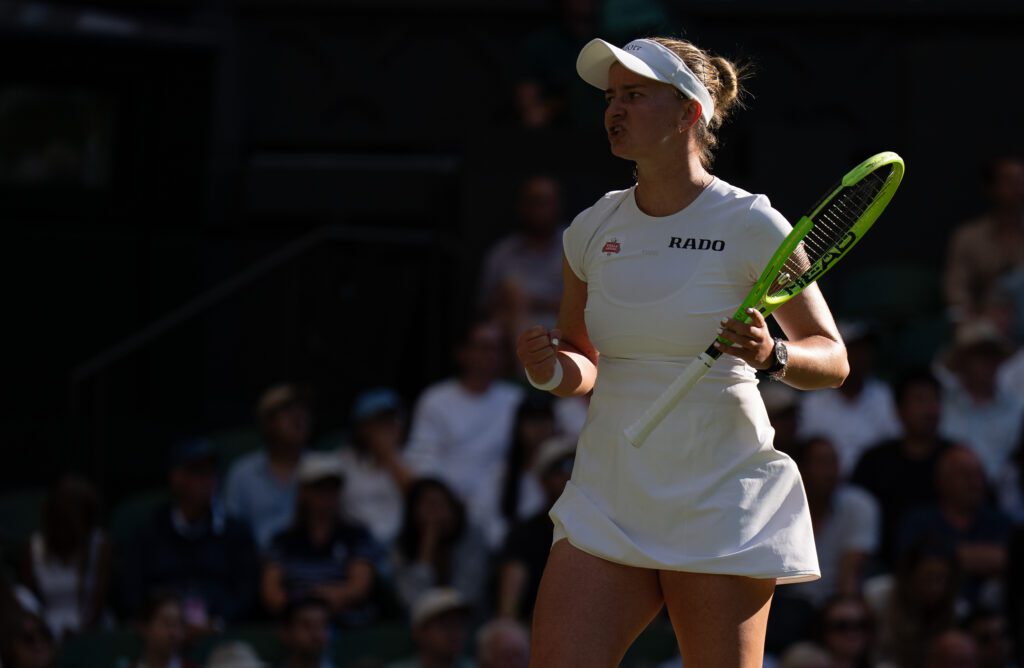 Barbora Krejcikova of the Czech Republic reacts during her match against Mirra Andreeva on day three at All England Lawn Tennis and Croquet Club.