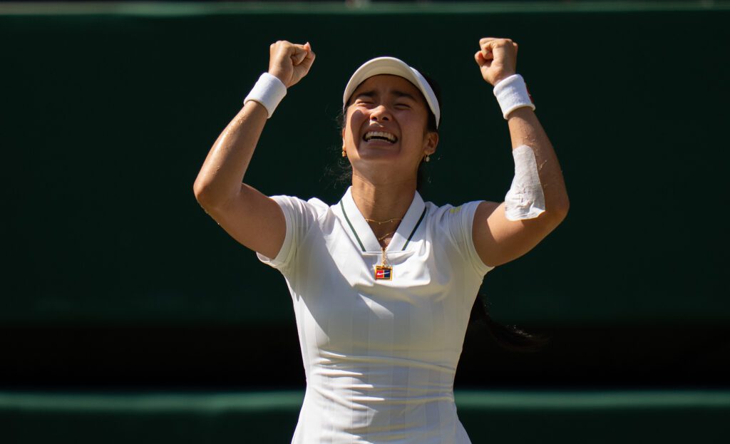 Alexandra Eala of the Philippinesr celebrates winning her match against Iga Swiatek of Poland on day six at All England Lawn Tennis and Croquet Club.
