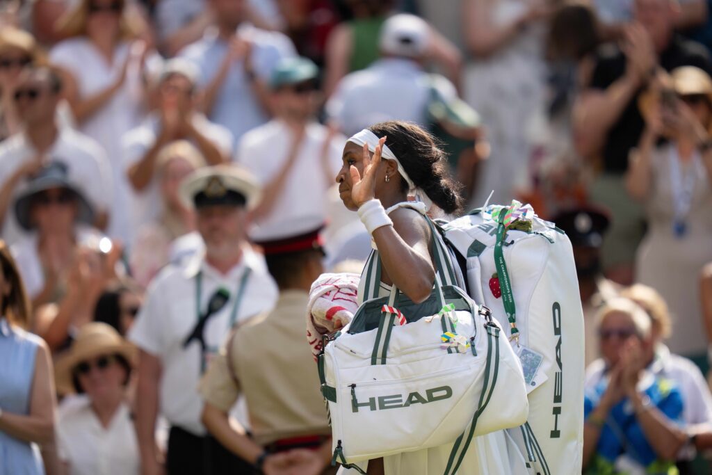 Coco Gauff of the United States leaves the court after losing her match against Karolina Muchova of the Czech Republic on day 11 at All England Lawn Tennis and Croquet Club.