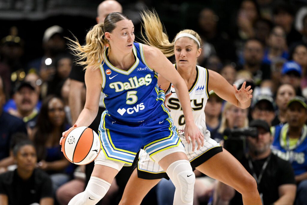 Dallas Wings guard Paige Bueckers (5) looks to move the ball past Chicago Sky guard Jacy Sheldon (0) during the second half at the American Airlines Center.