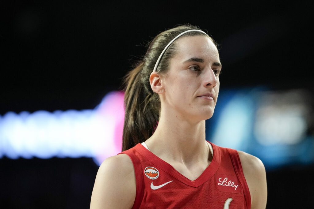 Indiana Fever guard Caitlin Clark (22) looks on during the third quarter of a WNBA basketball game against the Las Vegas Aces at Michelob Ultra Arena.