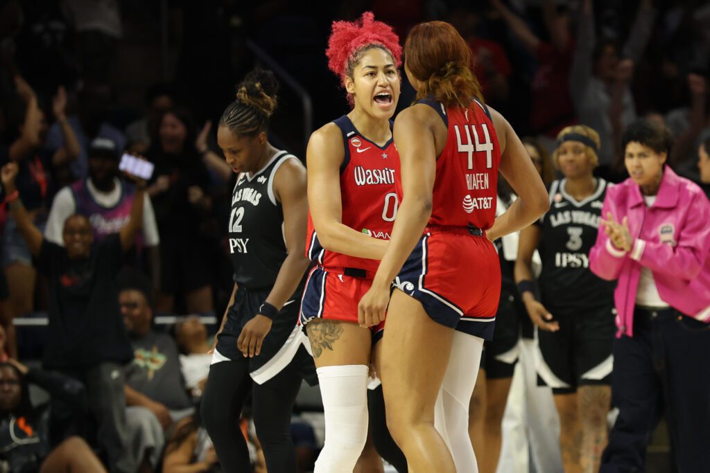 Washington Mystics center Shakira Austin (0) celebrates with Mystics forward Kiki Iriafen (44) after their game against the Las Vegas Aces at CareFirst Arena.