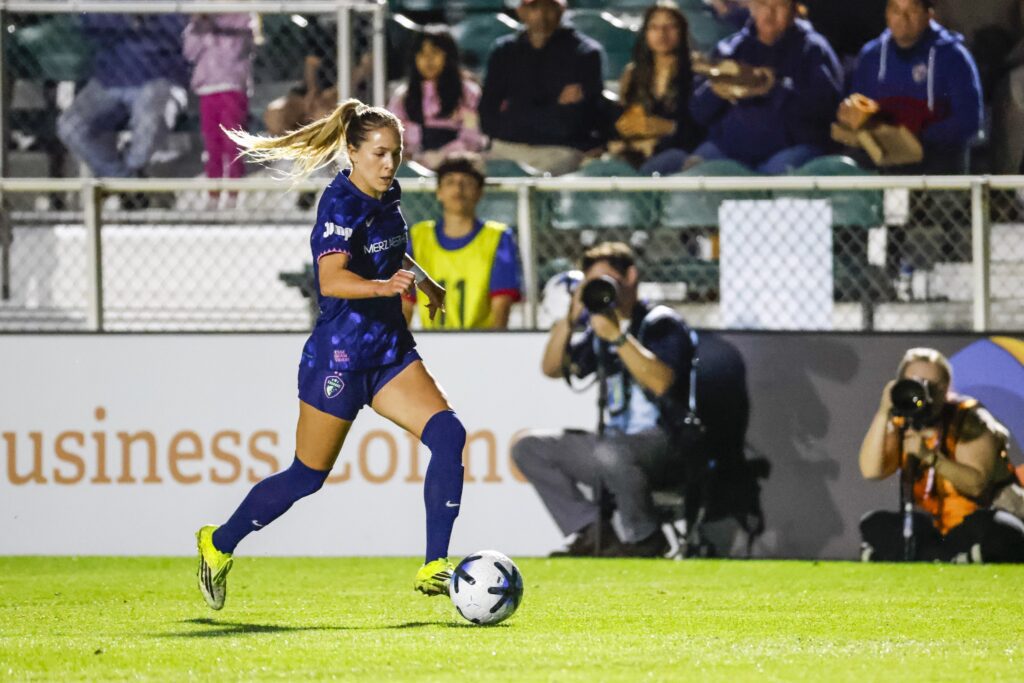 North Carolina Courage midfielder Ashley Sanchez (2) dribbles the ball during the first half of the game against the Racing Louisville FC at First Horizon Stadium at WakeMed Soccer Park.