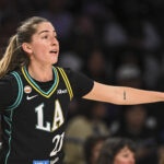 Los Angeles Sparks guard Kate Martin (21) reacts against the Chicago Sky during the first half at Crypto.com Arena.