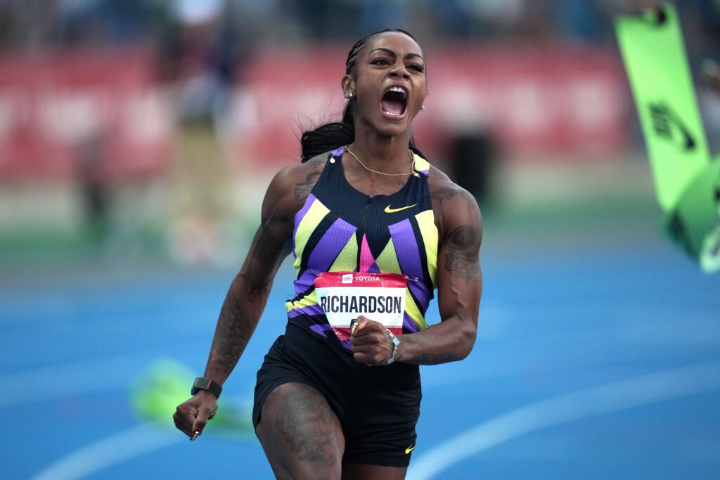 Sha'Carri Richardson celebrates after winning the women's 100m in 10.77 during the USATF Championships at Icahn Stadium.