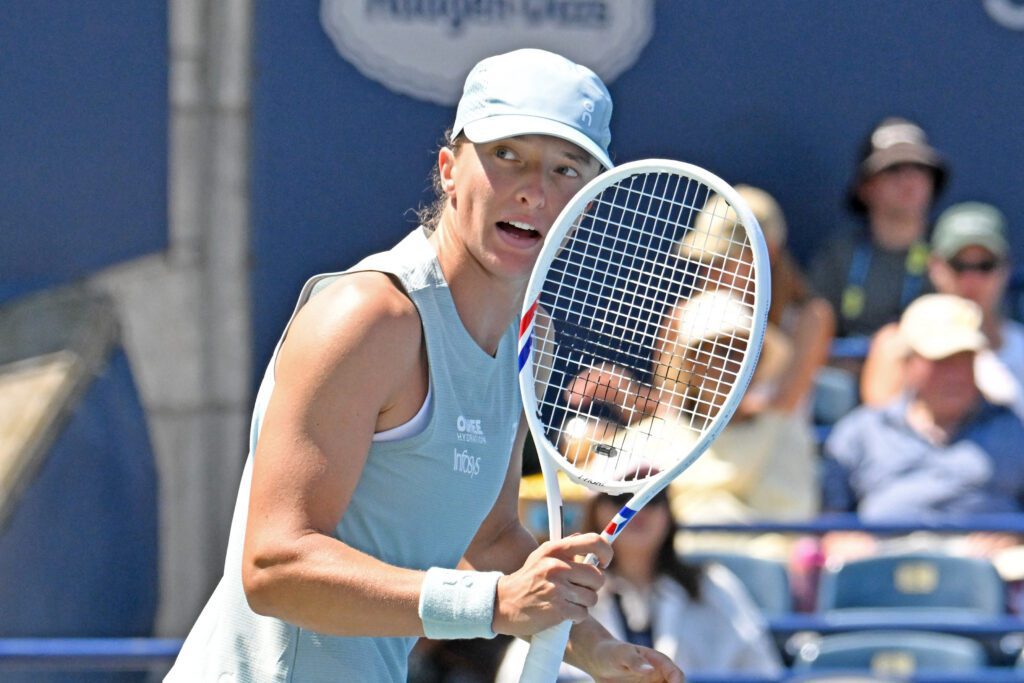 Iga Swiatek (POL) reacts after winning a point against Sara Bejlek (CZE) during second round play at Sobeys Stadium.