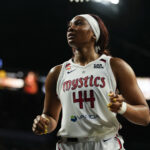 Washington Mystics forward Kiki Iriafen (44) competes during the third quarter of a WNBA basketball game against the Las Vegas Aces at Michelob Ultra Arena ahead of facing Kelsey Plum and Phoenix.
