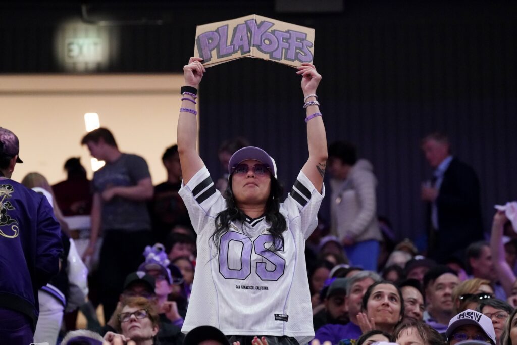 A Golden State Valkyries fan holds up a playoff sign during the game against the Dallas Wings in the fourth quarter at Chase Center.