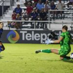North Carolina Courage midfielder Ashley Sanchez (2) scores a goal past Angel City FC goalkeeper Angelina Anderson (19) during the second half at First Horizon Stadium at WakeMed Soccer Park.