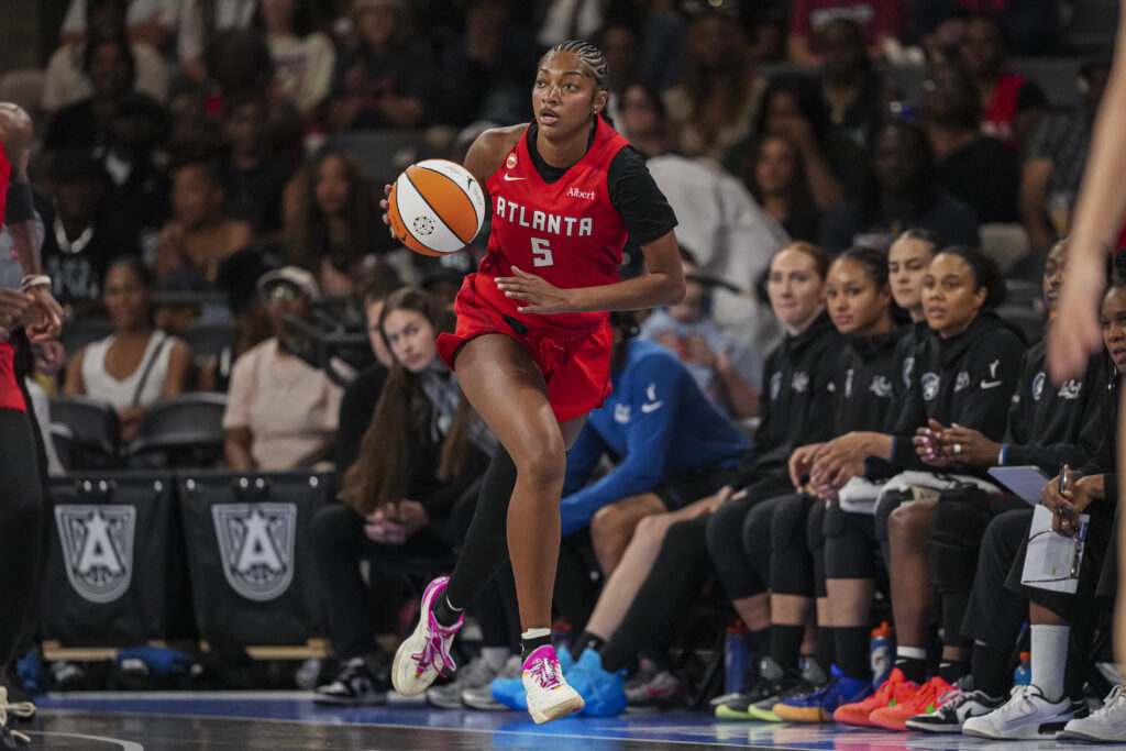 Atlanta Dream forward Angel Reese (5) controls the ball against the Minnesota Lynx during the first half at Gateway Center Arena at College Park.