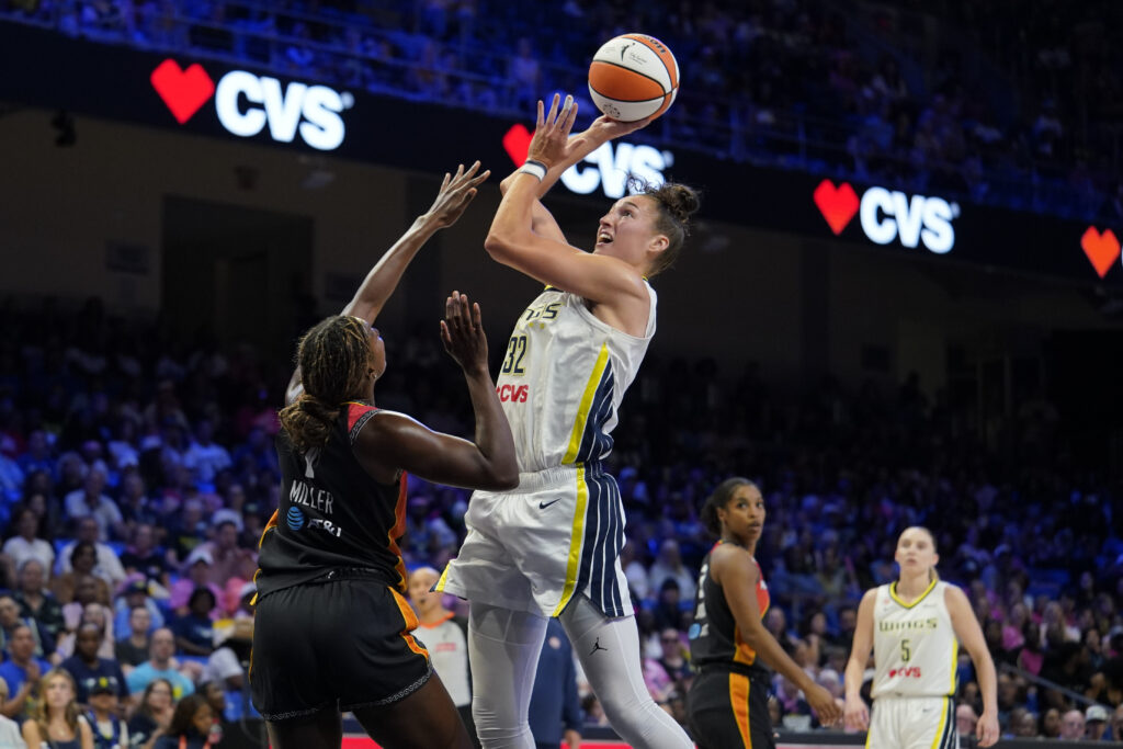 Dallas Wings forward Jessica Shepard (32) shoots over Connecticut Sun forward Diamond Miller (1) during the third quarter at College Park Center.