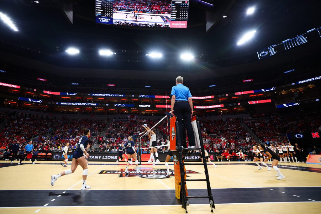 Rebekah Allick #5 of the Nebraska Huskers blocks the ball from the Penn St. Nittany Lions during the Division I Women's Volleyball Semifinals held at the KFC YUM! Center on December 19, 2024 in Louisville, Kentucky.
