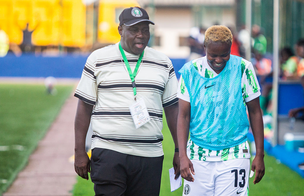 Justine Pwandi Madugu, Head Coach of the Super Falcons, talks to player Ngozi Sonia Okobi-Okeoghene during Nigeria's Super Falcons' 2-1 victory over Senegal's Teranga Lionesses in the first leg of an international friendly match at Remo Stadium in Ikenne, Ogun State, Nigeria, on June 5, 2026.
