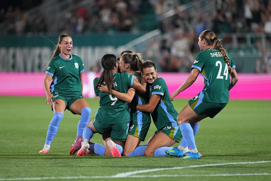 Janine Sonis #6 of Denver Summit FC celebrates with teammates after scoring the team's second goal during the NWSL match between Denver Summit FC and Utah Royals.