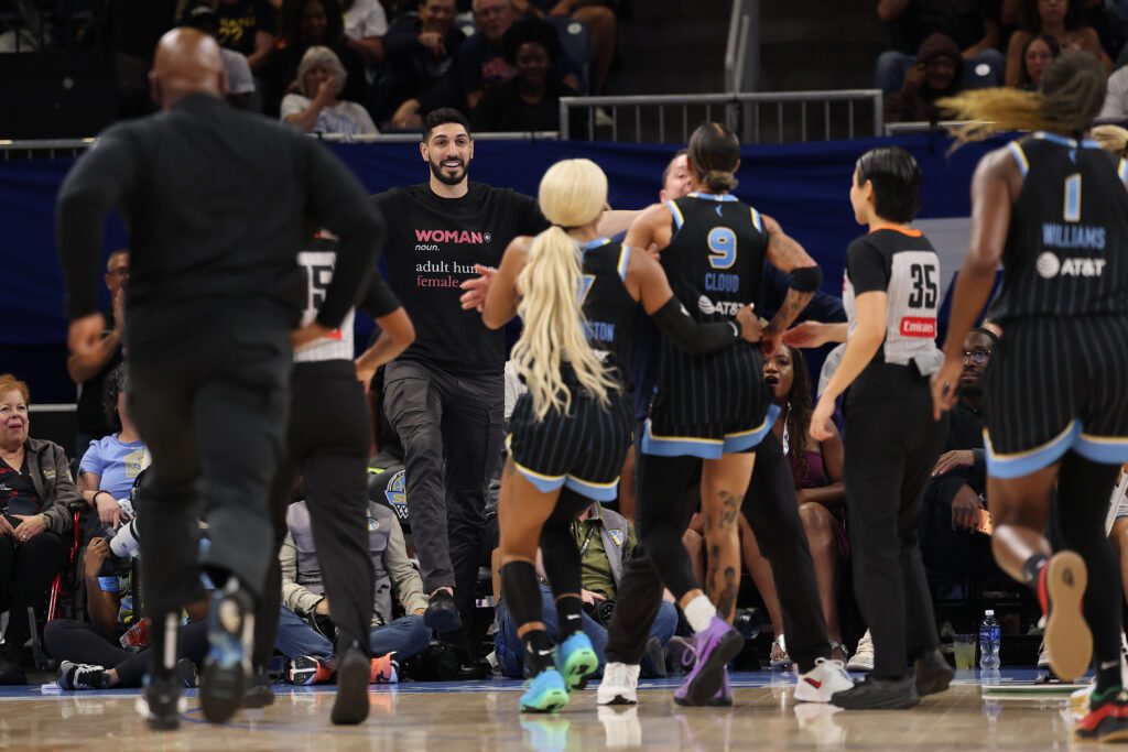 Former basketball player Enes Kanter Freedom and Natasha Cloud #9 of the Chicago Sky yell at one another during the second half between the Chicago Sky and the Indiana Fever at Wintrust Arena on August 23, 2026 in Chicago, Illinois.