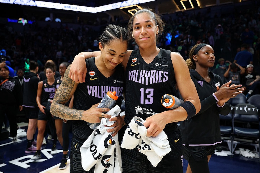 Gabby Williams #1 and Janelle Salaun #13 of the Golden State Valkyries celebrate the win against the Minnesota Lynx after the game at Target Center on August 24, 2026 in Minneapolis, Minnesota. The Valkyries defeated the Lynx 80-66.