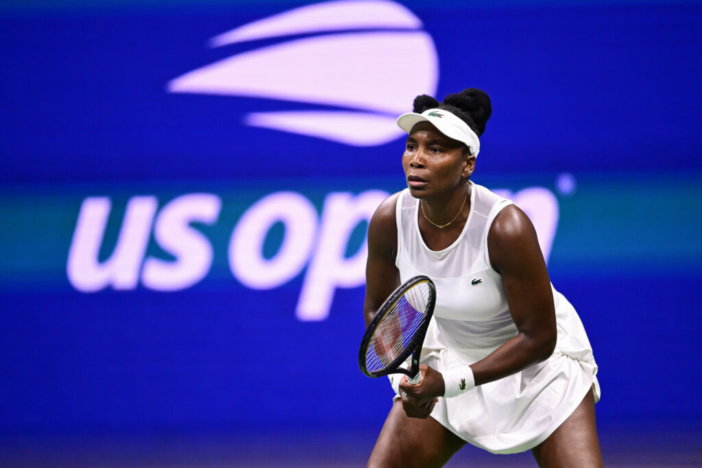 Venus Williams in action against Sofia Kenin during a Women's Singles match on Day One of the 2026 US Open at USTA Billie Jean King National Tennis Center.