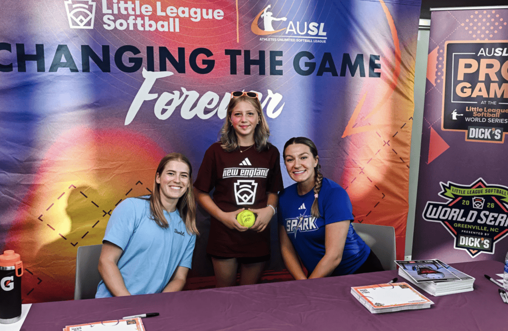 Athletes Unlimited Softball League (AUSL) players Sami Williams and Kinzie Hansen sign autographs at the 2026 LLWS.
