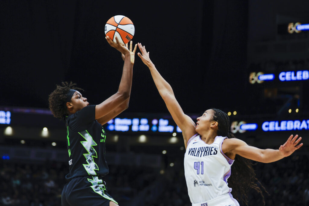 Seattle Storm center Dominique Malonga (14) shoots against Golden State Valkyries center Kiah Stokes (41) during the third quarter at Climate Pledge Arena.