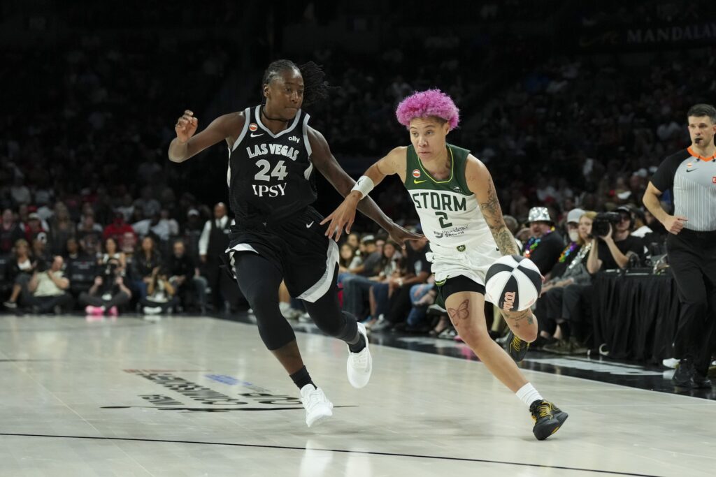 Seattle Storm guard Natasha Hiedeman (2) drives past Las Vegas Aces guard Jewell Loyd (24) in the second quarter of their game at Michelob Ultra Arena.