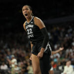 Las Vegas Aces center A'ja Wilson (22) reacts after scoring against the Indiana Fever during the third quarter of a WNBA basketball game at Michelob Ultra Arena.