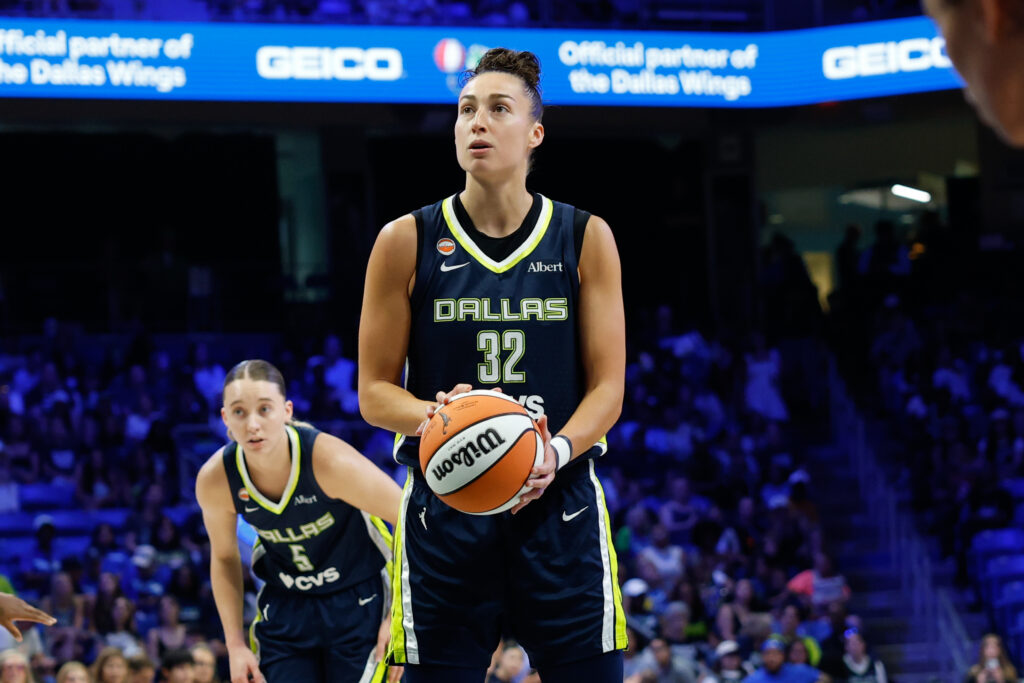 Dallas Wings forward Jessica Shepard (32) shoots a free throw during the first half against the Los Angeles Sparks at College Park Center.