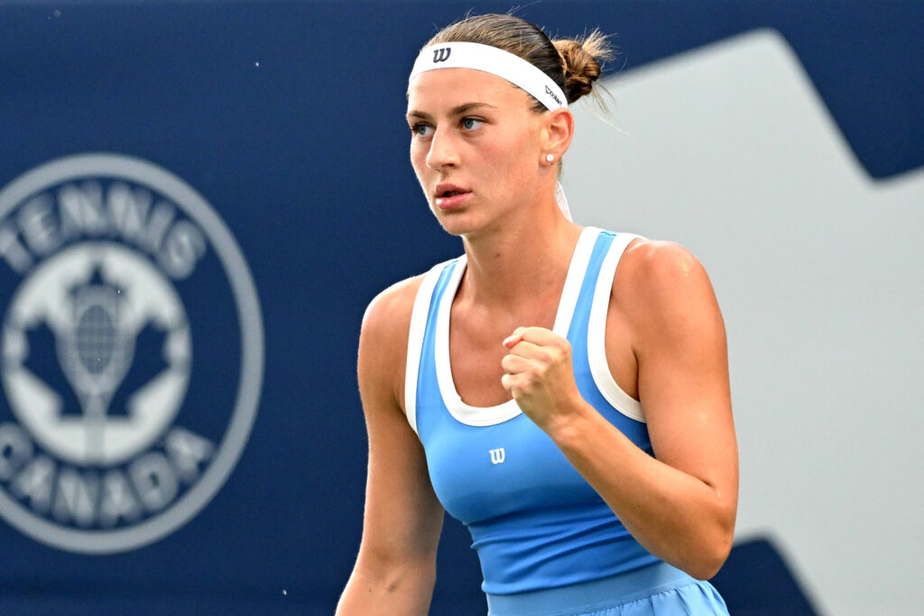 Marta Kostyuk (UKR) reacts after winning a point against Madison Keys (USA) during third round play at Sobeys Stadium.