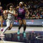 Minnesota Lynx guard Olivia Miles (5) drives to the basket as Washington Mystics guard Cotie McMahon (23) defends in the second half at CareFirst Arena.