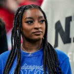 Simone Biles, wife of Indianapolis Colts safety Jonathan Owens (38), walks on the sideline on Saturday, Aug. 29, 2026, ahead of the game against the Detroit Lions.