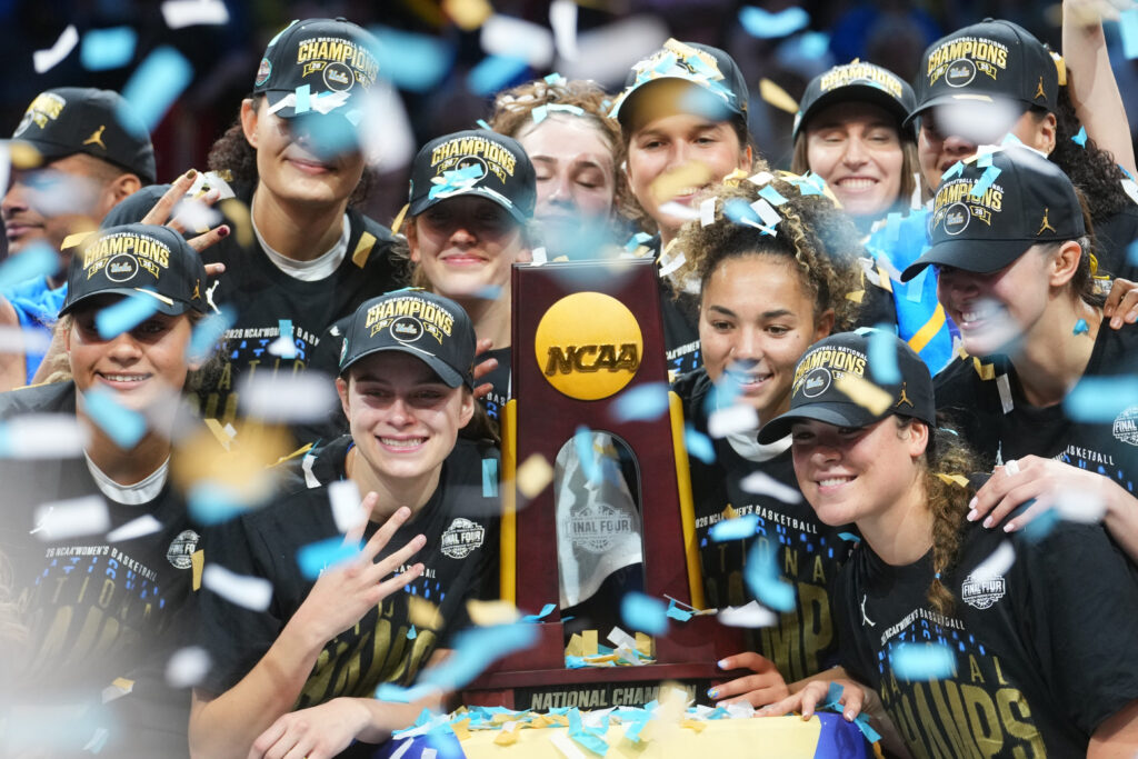 The UCLA Bruins celebrate their 79-51 win over the South Carolina Gamecocks to claim the NCAA women's basketball national championship at Mortgage Matchup Center in Phoenix.