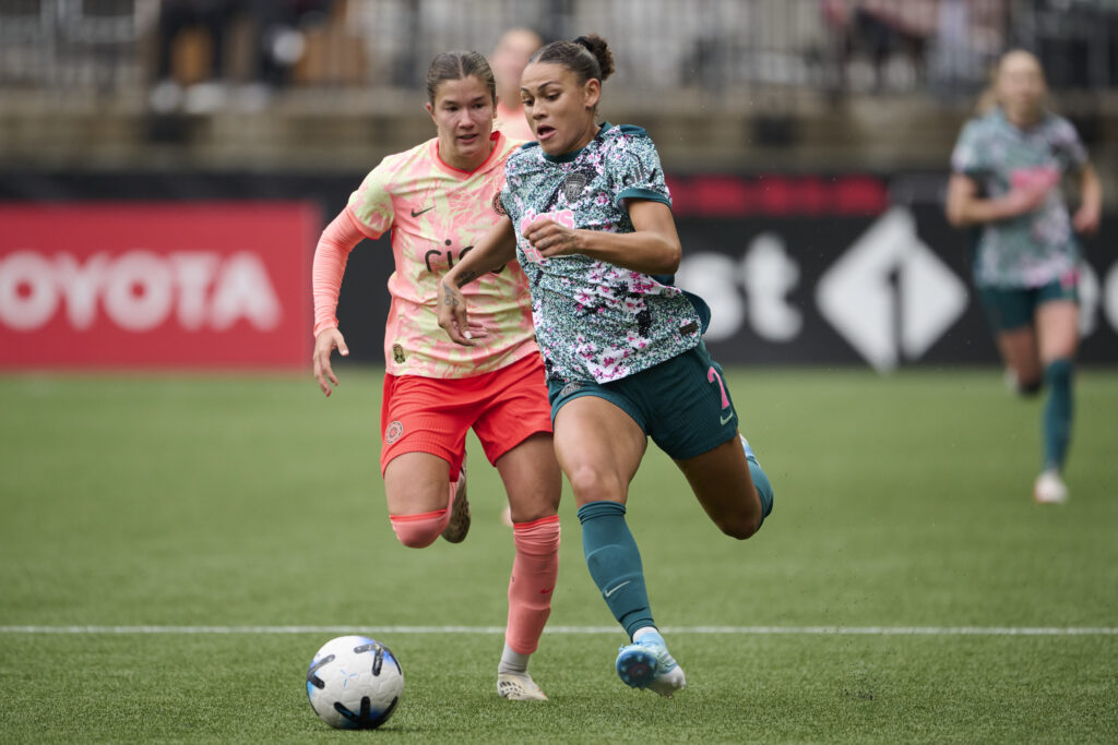 Washington Spirit forward Trinity Rodman (2) controls the ball during the first half against Portland Thorns FC forward Pietra Tordin (19) at Providence Park.