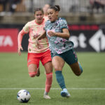 Washington Spirit forward Trinity Rodman (2) controls the ball during the first half against Portland Thorns FC forward Pietra Tordin (19) at Providence Park.