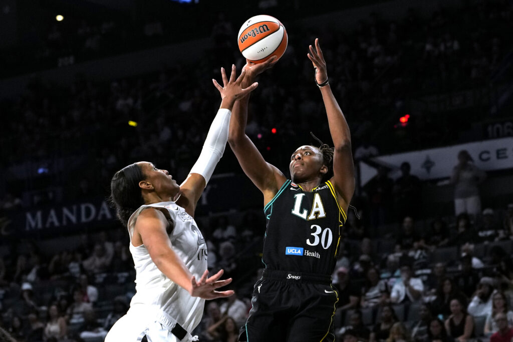 Los Angeles Sparks forward Nneka Ogwumike (30) shoots the ball against Las Vegas Aces center A'ja Wilson (22) during the third quarter of a WNBA basketball game at Michelob Ultra Arena.