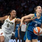 Sep 24, 2026; Minneapolis, Minnesota, USA; Minnesota Lynx forward Antonia Delaere (8) drives to the basket past Indiana Fever guard Kelsey Mitchell (0) in the first half at Target Center.