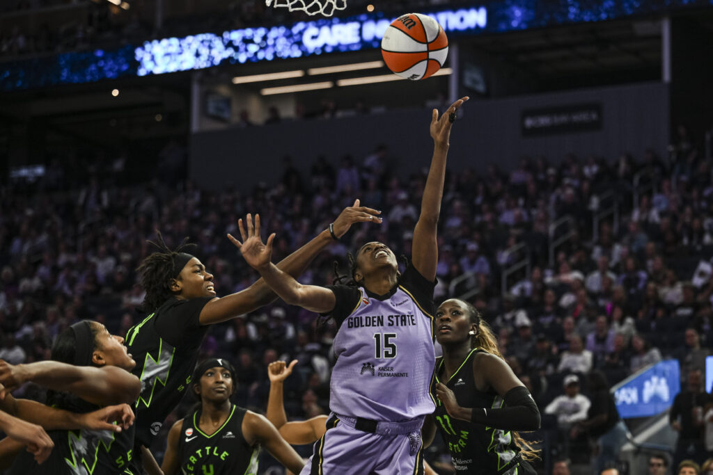 Golden State Valkyries guard Tiffany Hayes (15) goes for a layup against Seattle Storm center Dominique Malonga (14) during the third quarter at Chase Center.