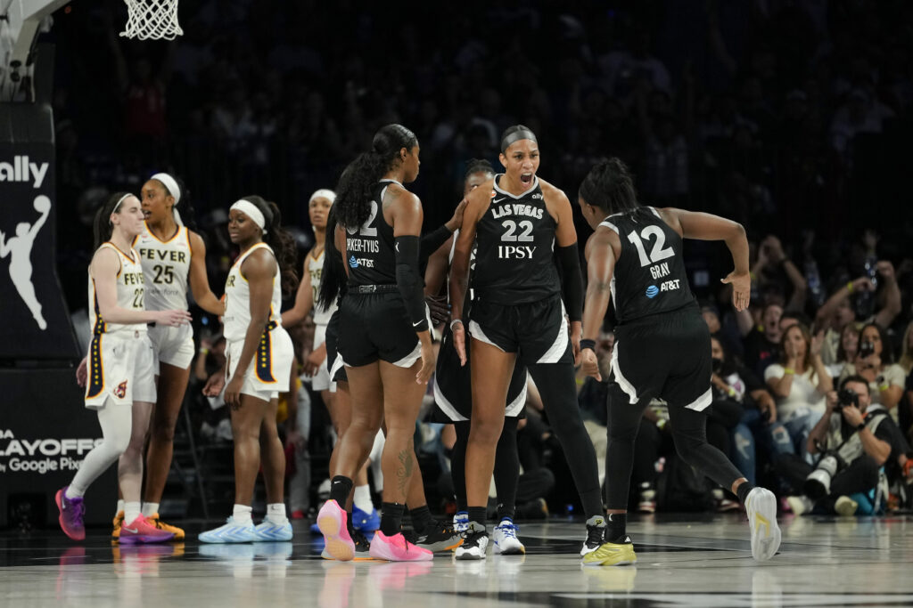 Las Vegas Aces center A'ja Wilson (22) celebrates with teammates after scoring against the Indiana Fever during the third quarter of game one of the first round for the 2026 WNBA Playoffs at Michelob Ultra Arena.