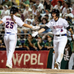 The San Francisco Firebells celebrate a score against the Boston Hunters.