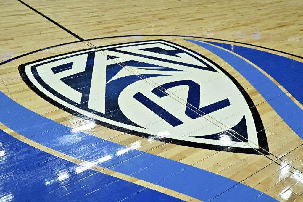 A Pac-12 tournament logo is shown on the court before a semifinal game.