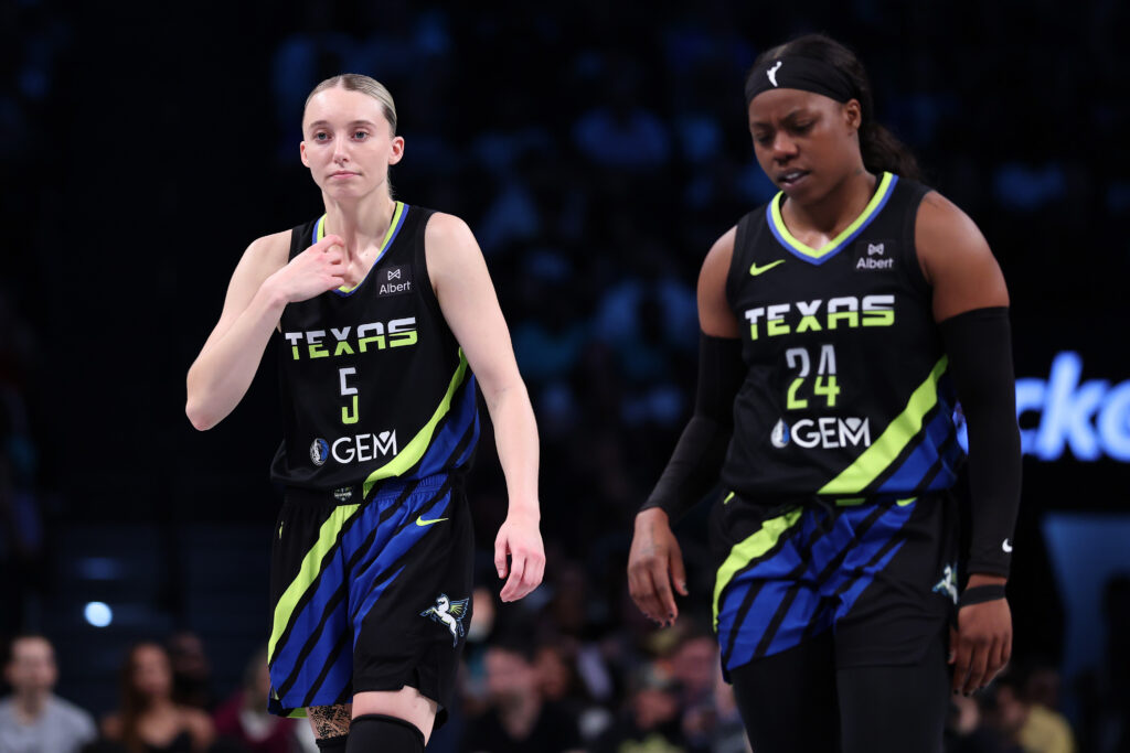 Paige Bueckers #5 and Arike Ogunbowale #24 of the Dallas Wings look on during game against the New York Liberty at Barclays Center.